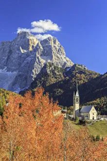 Crest Prints: Church of Selva of Cadore with Mount Pelmo in the background in autumn. Dolomites