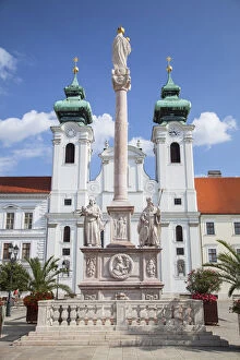 Images Dated 15th October 2013: Church of St Ignatius Loyola and Trinity Column in Szechenyi Square, Gyor, Western