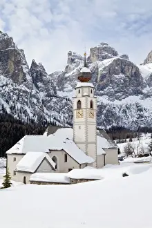 Ski Resorts Prints: The church and village of Colfosco in Badia (1645m) and Sella Massif range of Mountains
