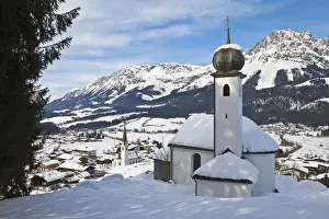 Ski Resorts Prints: Churches of Ellmau ski resort, Wilder Kaiser mountains beyond, Tirol, Austria