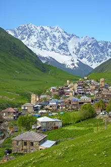 Western Asia Prints: Chvibiani and Zhibiani with snow-covered Shkhara peak in background, Ushguli