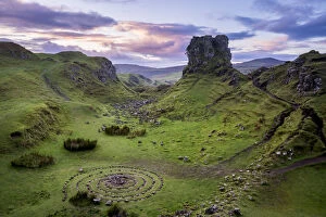 Alba Gallery: Circular rock pattern on green landscape near Castle Ewen at sunset, Fairy Glen, Isle