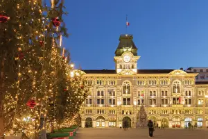 City Hall Prints: The city hall in Unita d Italia square in Trieste in Christmas time at dusk. Trieste city