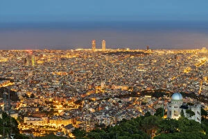 City skyline with Fabra astronomical observatory at twilight, Barcelona, Catalonia, Spain