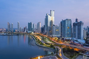 City skyline illuminated at dusk, Panama City, Panama, Central America