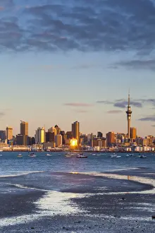 Moorings Prints: City skyline & Waitemata Harbour illuminated at sunset, Auckland, North Island, New
