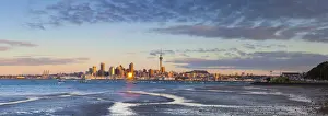 Moorings Prints: City skyline & Waitemata Harbour illuminated at sunset, Auckland, North Island, New