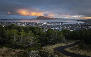 Seaport Prints: City of Torshavn at sunset. Streymoy, Faroe Islands