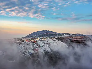 Thira Prints: Cityscape of Fira at foggy sunrise, Santorini or Thira Island, Cyclades, Greece