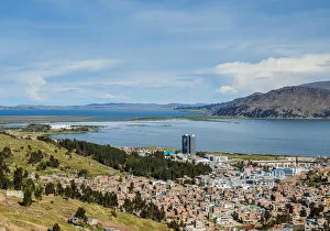 Cityscape of Puno and Lake Titicaca, elevated view, Puno Region, Peru