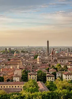 Cityscape with San Domenico Basilica and Asinelli Tower at sunset, elevated view, Bologna