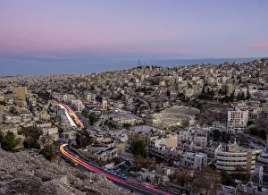 East Bank Prints: Cityscape seen from Citadel Hill at dusk, Amman, Amman Governorate, Jordan