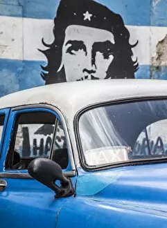 Mural Gallery: Classic American car and Cuban flag, Habana Vieja, Havana, Cuba