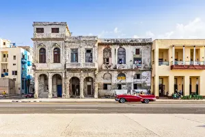 Habana Prints: A classic car driving on the Malecon, La Habana Vieja (Old Town), Havana, Cuba