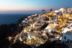 Aegean Prints: Classic view over Oia at dusk, from the old fort