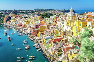 Campania Prints: Clear sky over Procida island and harbor overlooking the crystal clear sea