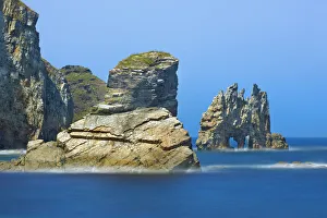 Rock Cliff Prints: Cliff landscape with rock arch - Spain, Asturias, Eo-Navia, Luarca