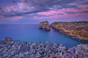 Cliff landscape with rock arch - Spain, Asturias, Oriente, Ribadesella
