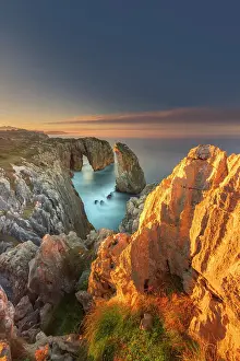 Cliff landscape with rock needle and rock arch called Pena Flecha- Spain, Asturias, Oriente, Ribadesella, Bufones de Pria - Bay of Biscay, Costa Verde