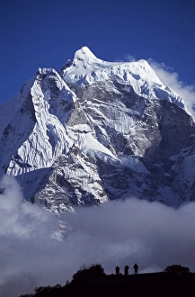 Everest Region Gallery: Climbers on ridge in the Dodh Koshir River Valley photograph