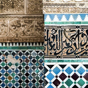 African Culture Collection: Close up of decorated ancient walls with ceramic tiles and carved Arabic script, Fez, Morocco