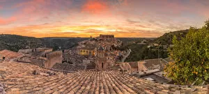 Sicily Gallery: Close up of a typical rooftop with the enchanting hilltop city of Ragusa Ibla in the