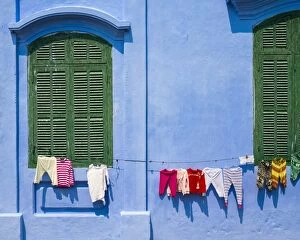 Images Dated 26th February 2015: Clothes hung out to dry on a blue wall, Hoi An, Quang Nam Province, Vietnam