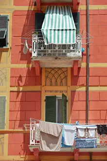 La Spezia Prints: Clothes line on a balcony of a building in the historical cask of Lerici