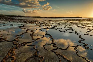 Low Tide Prints: Clouds Refelcting in Tide Pools at Sunset, Vila Nova de Milfontes, Alentejo, Portugal