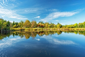 Keystone Province Prints: Clouds reflected along the Pinawa Channel Heritage Walk. Pinawa, Manitoba, Canada