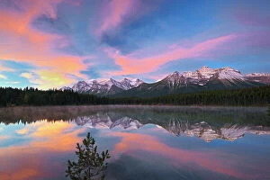 Images Dated 20th April 2023: Clouds and Rocky Mountains reflected in Herbert Lake, Banff National Park, Alberta, Canada