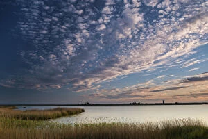 Cloudscape over Breydon Water with Berney Arms Mill in distance, near Great Yarmouth