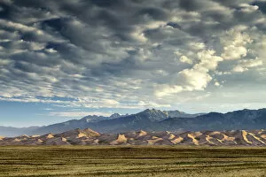 Desolate Gallery: Cloudscape over Great Sand Dunes National Park, Colorado, USA