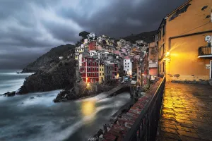 Typical House Prints: Cloudy evening over the village of Riomaggiore, National Park of Cinque Terre