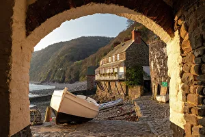 April Prints: Clovelly harbour through archway, Devon, England. Spring (April) 2019