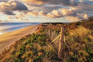 Michael Blanchette Prints: Coast Guard Beach at sunset with beach fence and clouds