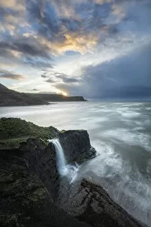 Images Dated 6th April 2021: Coastal waterfall at sunrise, Isle of Purbeck, Jurassic Coast World Heritage Site, Dorset
