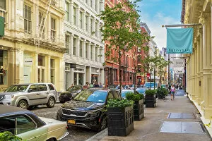 Cobbled street with luxury shops in SoHo neighborhood, Manhattan, New York, USA