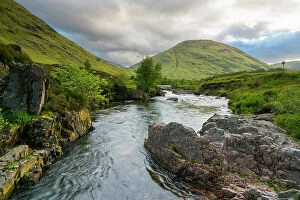 Coe river against cloudy sky, Glencoe, Scottish Highlands, Scotland, UK