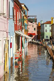 Unesco World Herritage Site Prints: Colored Houses on the Waterfront on the Island of Burano during High Water (Acqua alta)