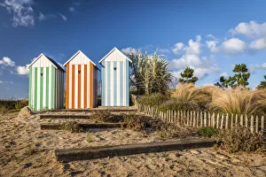 Sandy Beach Prints: Colorful beach huts in Roscoff, Finistere, Brittany, France