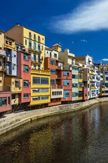 Images Dated 19th June 2014: Colorful buildings along the banks of River Onyar in Girona, Catalonia, Spain