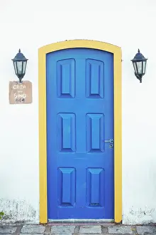 Coastal Town Prints: A colorful colonial architecture house door on the Orla Bardot street
