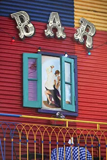 A colorful detail of a couple dancing tango at the 'Cafe de los Artistas'