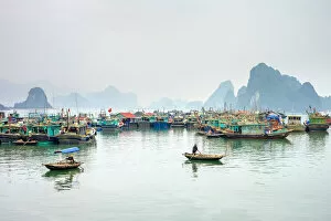 Colorful fishing boats in the harbor at Cai Rong, Quang Ninh Province, Vietnam