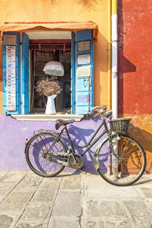 Bike Gallery: Colorful house facade in Burano island with old bike, Burano, Venice, Veneto, Italy
