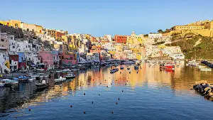 Naples Province Prints: Colorful houses in the fishing village of La Corricella at sunset