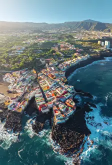 Canary Prints: Colorful houses in Punta Brava with Teide in the background
