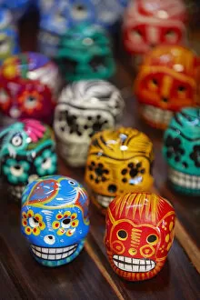 Colorful Mexican skullls (Calaca) on sale in a souvenir shop of the Campeche historical cask, Yucatan, Mexico