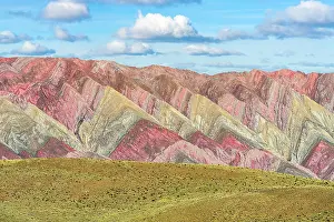 Hornocal Prints: Colorful mountains behind a grassy plateau